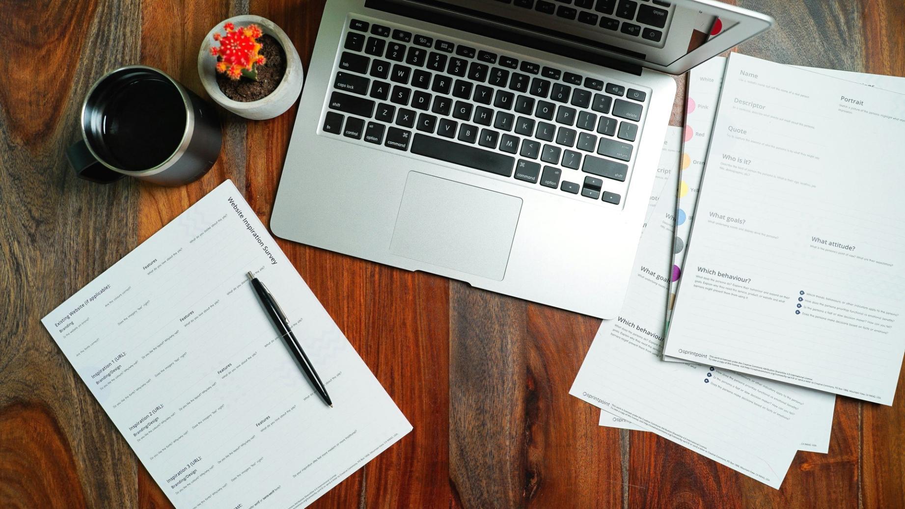 Financial analysis workspace with charts and data visualizations