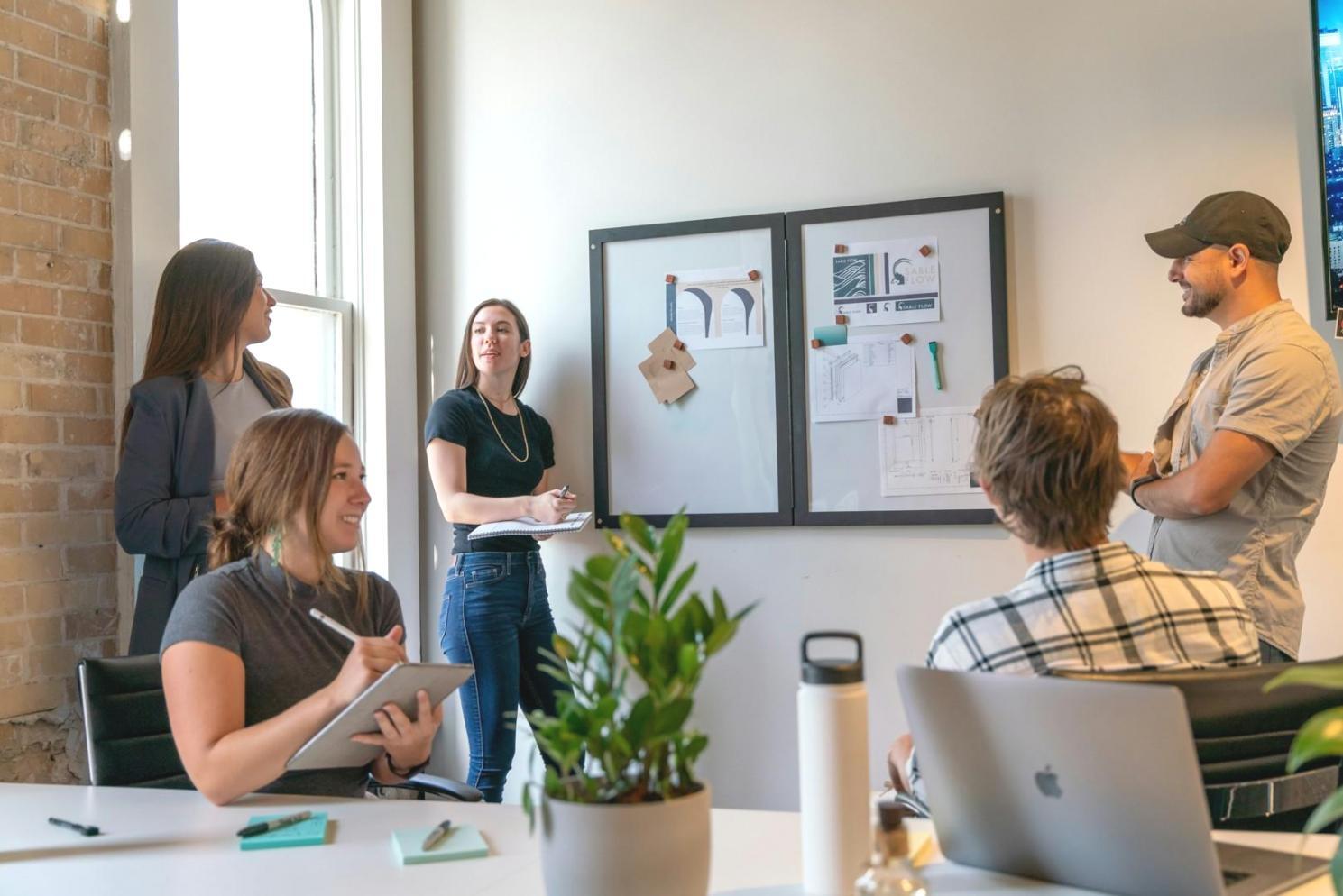 Professional collaboration meeting showing strategic partnership development in modern office environment
