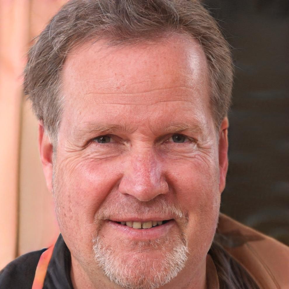 Professional headshot of business partner